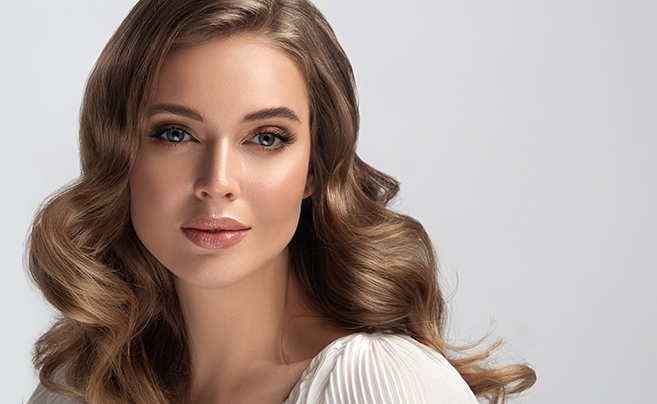 Beauty,Woman,In,A,White,Shirt,With,Long,And,Shiny