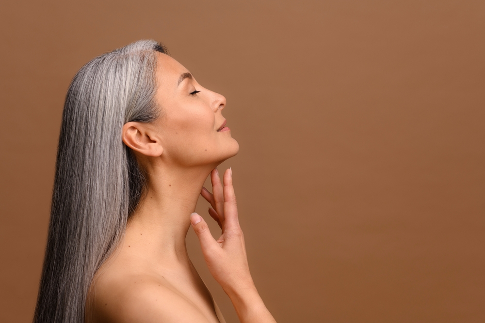 Woman has youthful jawline after eliminating excess fat from beneath her chin with Kybella.